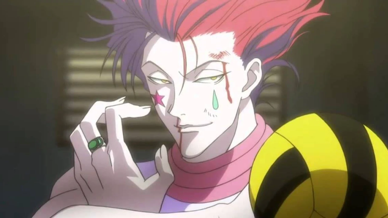 Hisoka observa uma carta em Hunter x Hunter