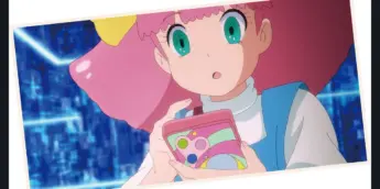 Minky Momo segura um celular em imagem de divulgação do novo OVA
