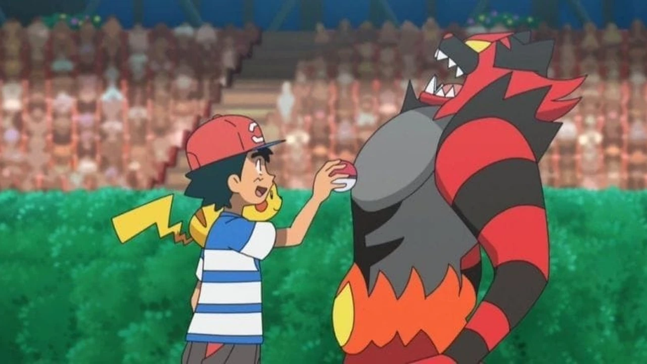 Ash comemora ao lado de seu Incineroar