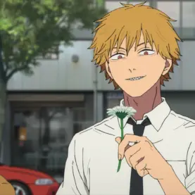 Denji segura uma flor em cena de Chainsaw Man – O Filme: Arco da Reze.
