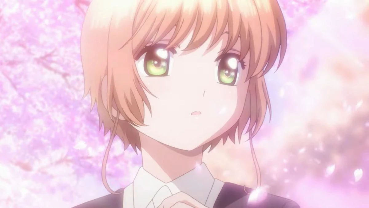 Sakura Kinomoto diante das cerejeiras em Cardcaptor Sakura: Clear Card